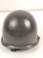 U.S. Army WWII, front seam M1 steel helmet shell. Original paint, reused by US Army after WWII