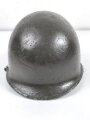 U.S. Army WWII, front seam M1 steel helmet shell. Original paint, reused by US Army after WWII