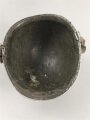 U.S. Army WWII, front seam M1 steel helmet shell. Original paint, reused by US Army after WWII