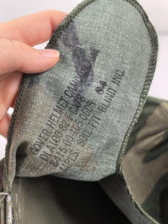 U.S. Army, M1 steel helmet . Liner sweatband dated 1983, Woodland cover dated 1982.