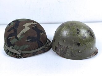 U.S. Army, M1 steel helmet . Liner sweatband dated 1983, Woodland cover dated 1982.