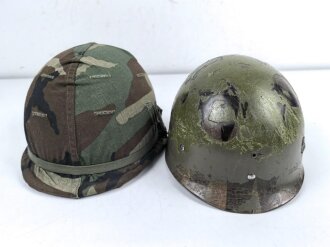 U.S. Army, M1 steel helmet . Liner sweatband dated 1983, Woodland cover dated 1982.