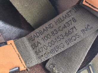 U.S. Army, M1 steel helmet . Liner sweatband dated 1983, Woodland cover dated 1982.