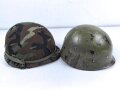 U.S. Army, M1 steel helmet . Liner sweatband dated 1983, Woodland cover dated 1982.