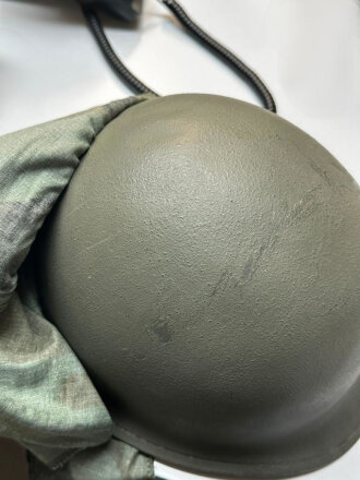 U.S. Army, M1 steel helmet . Liner sweatband dated 1985, Woodland cover dated 1982.