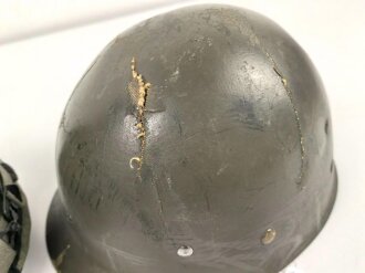 U.S. Army, M1 steel helmet . Liner sweatband dated 1985, Woodland cover dated 1982.