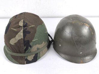 U.S. Army, M1 steel helmet . Liner sweatband dated 1985, Woodland cover dated 1982.