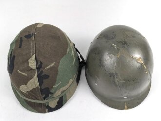 U.S. Army, M1 steel helmet . Liner sweatband dated 1985, Woodland cover dated 1982.