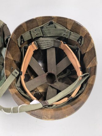 U.S. Army, M1 steel helmet . Liner sweatband dated 1985, Woodland cover dated 1982.