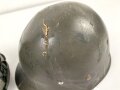 U.S. Army, M1 steel helmet . Liner sweatband dated 1985, Woodland cover dated 1982.