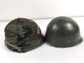 U.S. Army, M1 steel helmet . Liner sweatband dated 1985, Woodland cover dated 1982.