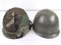 U.S. Army, M1 steel helmet . Liner sweatband dated 1985, Woodland cover dated 1982.