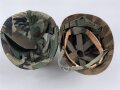 U.S. Army, M1 steel helmet . Liner sweatband dated 1985, Woodland cover dated 1982.