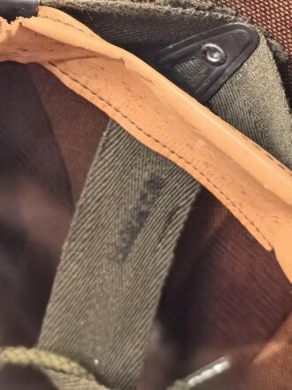 U.S. Army, M1 steel helmet . Liner sweatband dated 1983, Woodland cover dated 1984, Paratrooper chinstrap original ?.