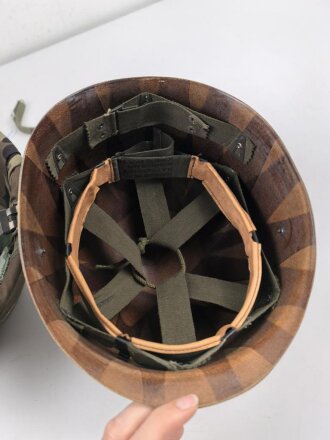 U.S. Army, M1 steel helmet . Liner sweatband dated 1983, Woodland cover dated 1984, Paratrooper chinstrap original ?.