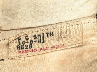 U.S. Navy dress uniform, jacket and pants, both in good condition