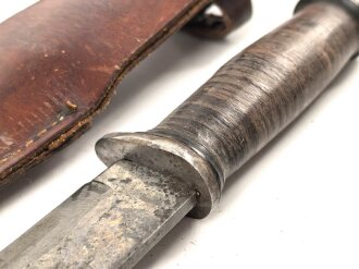 U.S. WWII Cattaraugus 2250 Commando Fighting Knife. Good condition, in leather scabbard