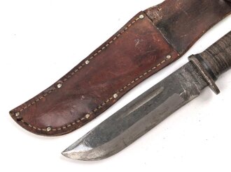 U.S. WWII Cattaraugus 2250 Commando Fighting Knife. Good condition, in leather scabbard