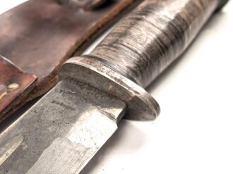 U.S. WWII Cattaraugus 2250 Commando Fighting Knife. Good condition, in leather scabbard
