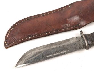 U.S. WWII Cattaraugus 2250 Commando Fighting Knife. Good condition, in leather scabbard