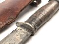 U.S. WWII Cattaraugus 2250 Commando Fighting Knife. Good condition, in leather scabbard