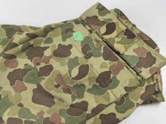 U.S. Army, 1943 dated Camo HBT combat trousers. Unissued, with cutters tags. Size 34 x 31, King Kard Overall Co.