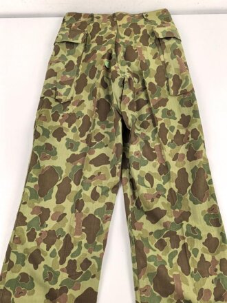 U.S. Army, 1943 dated Camo HBT combat trousers. Unissued, with cutters tags. Size 34 x 31, King Kard Overall Co.