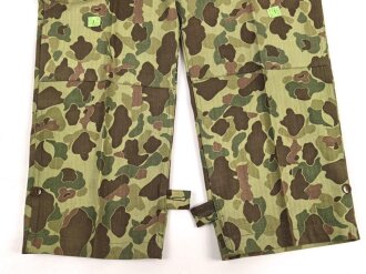 U.S. Army, 1943 dated Camo HBT combat trousers. Unissued, with cutters tags. Size 34 x 31, King Kard Overall Co.