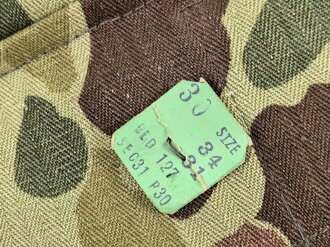 U.S. Army, 1943 dated Camo HBT combat trousers. Unissued, with cutters tags. Size 34 x 31, King Kard Overall Co.