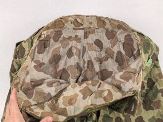 U.S. Army, 1943 dated Camo HBT combat trousers. Unissued, with cutters tags. Size 34 x 31, King Kard Overall Co.
