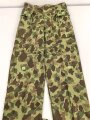 U.S. Army, 1943 dated Camo HBT combat trousers. Unissued, with cutters tags. Size 34 x 31, King Kard Overall Co.