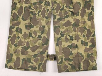 U.S. Army, 1943 dated Camo HBT combat trousers. Unissued, with cutters tags. Size 34 x 31, King Kard Overall Co.