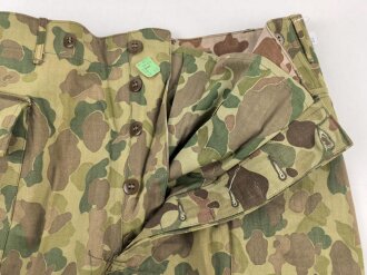 U.S. Army, 1943 dated Camo HBT combat trousers. Unissued, with cutters tags. Size 34 x 31, King Kard Overall Co.