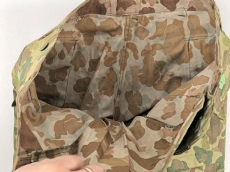 U.S. Army, 1943 dated Camo HBT combat trousers. Unissued, with cutters tags. Size 34 x 31, King Kard Overall Co.