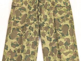 U.S. Army, 1943 dated Camo HBT combat trousers. Unissued, with cutters tags. Size 34 x 31, King Kard Overall Co.