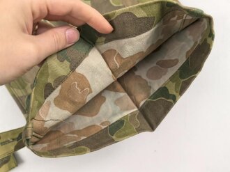 U.S. Army, 1943 dated Camo HBT combat trousers. Unissued, with cutters tags. Size 34 x 31, King Kard Overall Co.