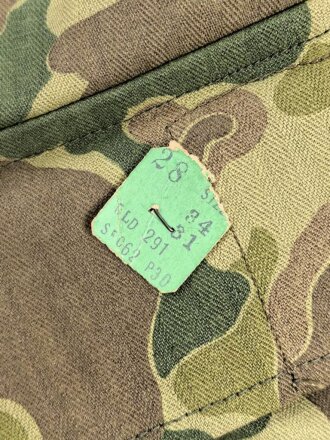 U.S. Army, 1943 dated Camo HBT combat trousers. Unissued, with cutters tags. Size 34 x 31, King Kard Overall Co.