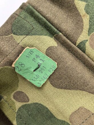 U.S. Army, 1943 dated Camo HBT combat trousers. Unissued, with cutters tags. Size 34 x 31, King Kard Overall Co.