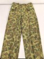 U.S. Army, 1943 dated Camo HBT combat trousers. Unissued, with cutters tags. Size 34 x 31, King Kard Overall Co.