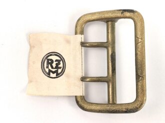 Zweidornschnalle nach Vorschrift der NSDAP. 58mm Höhe, vergoldet. Ungetragen, mit RZM Etikett