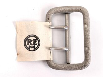 Zweidornschnalle nach Vorschrift der NSDAP. 58mm Höhe.  Ungetragen, mit RZM Etikett