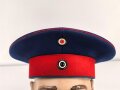 Preußen, 2. Garde Ulanen Regiment. Ulanka, Tellermütze  und gerahmtes Foto. Getragen, die Ulanka mit Flickstelle, dennoch guter Gesamtzustand, zusammengehörig