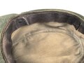 Bergmütze für Gebirgstruppen der Wehrmacht. Getragenes Stück, die Effekten original vernäht, Kopfgrösse 55