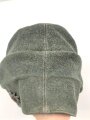 Bergmütze für Gebirgstruppen der Wehrmacht. Getragenes Stück, die Effekten original vernäht, Kopfgrösse 55