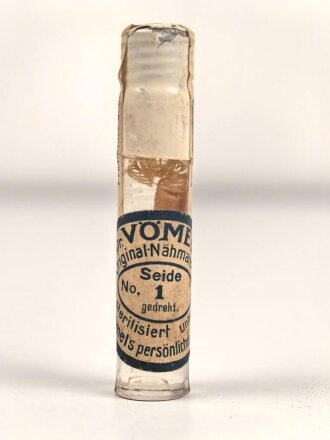 Glasröhrchen mit Wundnähseide