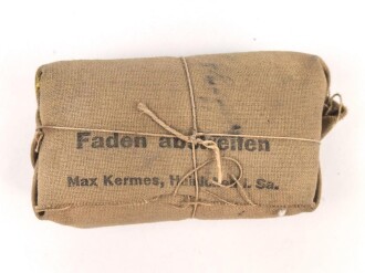 Verbandpäckchen Wehrmacht für den Verbandkasten und die Verbandspäckchentasche der Feldbluse. Kleines Modell datiert 1938