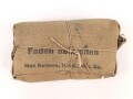 Verbandpäckchen Wehrmacht für den Verbandkasten und die Verbandspäckchentasche der Feldbluse. Kleines Modell datiert 1938
