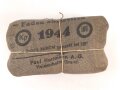 Verbandpäckchen Wehrmacht für den Verbandkasten und die Verbandspäckchentasche der Feldbluse. Kleines Modell datiert 1944