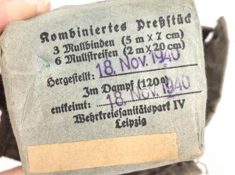 Pack "kombiniertes Preßstück" datiert 1940, in Hülle, gehört so in der KFZ Verbandkasten der Wehrmacht