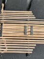 Vorrichtung zum bergen Verwundeter im Gebirge. Die Holzlattung mittig 132cm lang. Sowohl zum hinterherziehen im Schnee als auch zum Abseilen gedacht. Ungereinigtes Stück